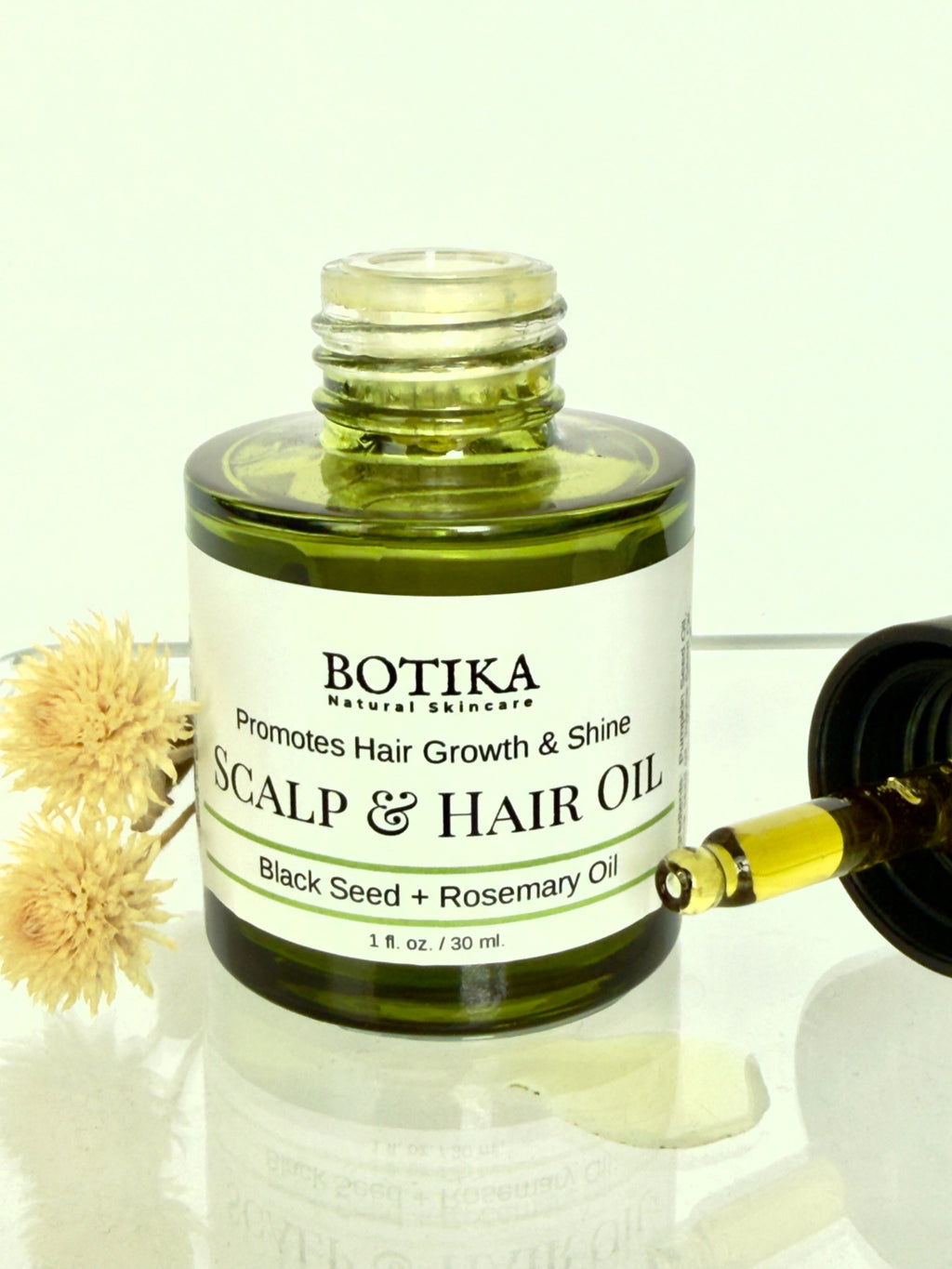 Aceite para el cuero cabelludo y el crecimiento del cabello con semilla negra y ashwagandha